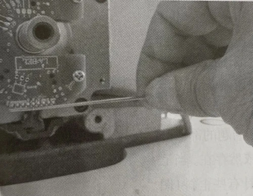 wipe off the oil contamination around the components with a cloth and weld the loose components